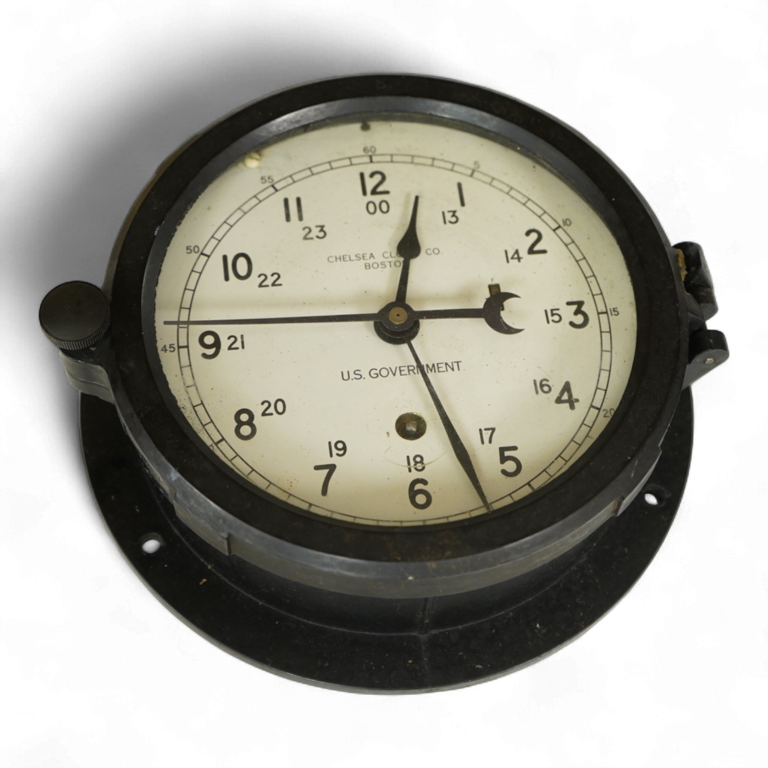 A U.S. Government Chelsea Clock Co., Boston, ship’s bulkhead clock in Bakelite case, diameter 17cm with key